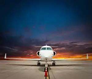 jet plane parked with nice sky
