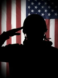 Soldier saluting the American flag