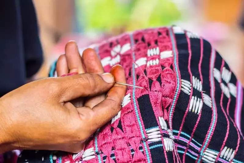 Woman Making a Quilt