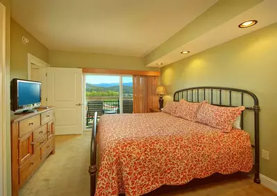 A beautiful bedroom in a condo in Pigeon Forge TN.