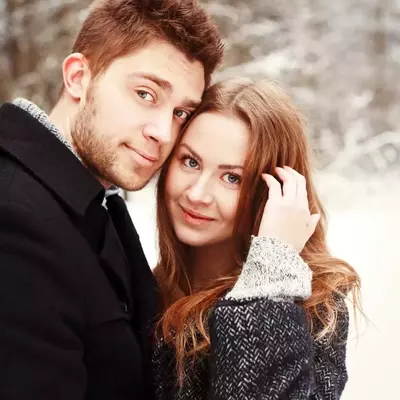 Happy couple in a romantic wintry scene in Pigeon Forge