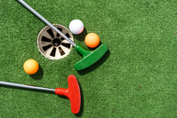 mini golf clubs and balls